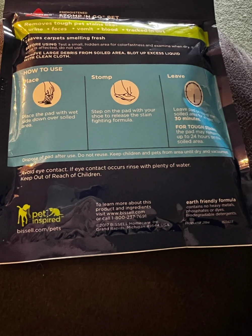 Bissell Blue and Green Stomp 'N Go Pet Stain Lifting Pad.